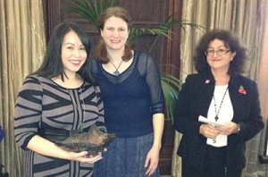 Three women standing side by side. Angela Martinez Dy, Laura Parsons and Dr. Christine Atkinson.